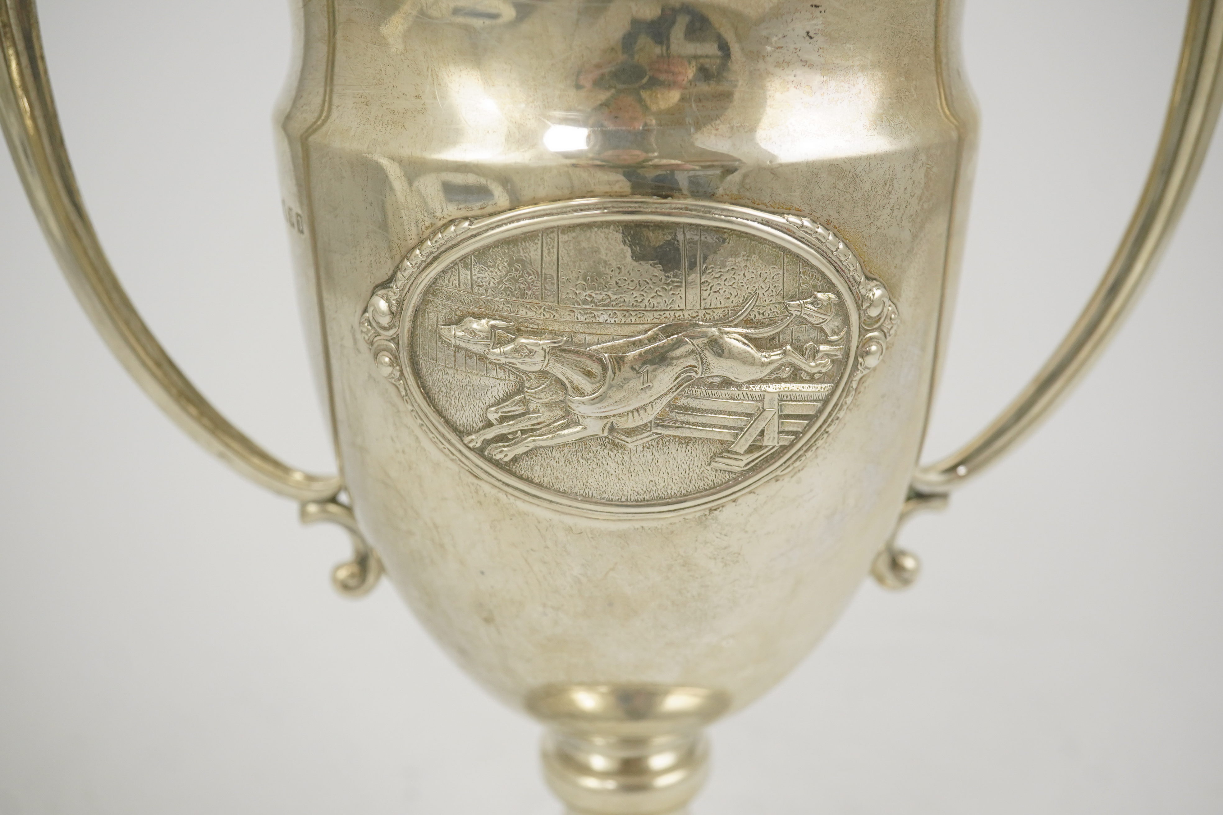 A George V silver two handled presentation greyhound trophy cup, 'The Purley Cup', by Blackmore & Fletcher Ltd